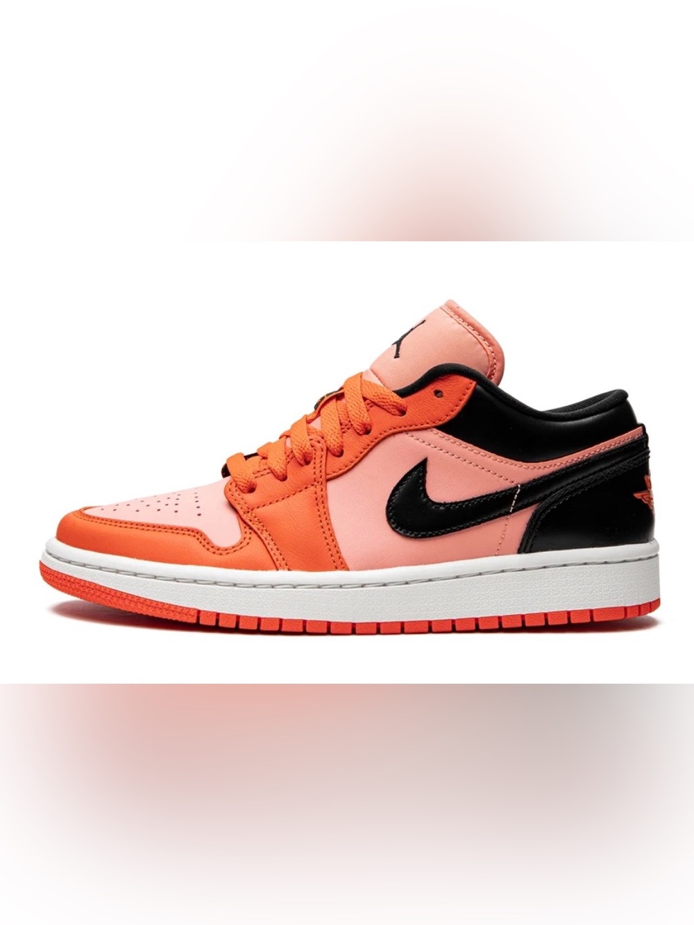 Nike Low Top Sneaker - Pink, Orange & Black Accents. Has new tag was worn once.